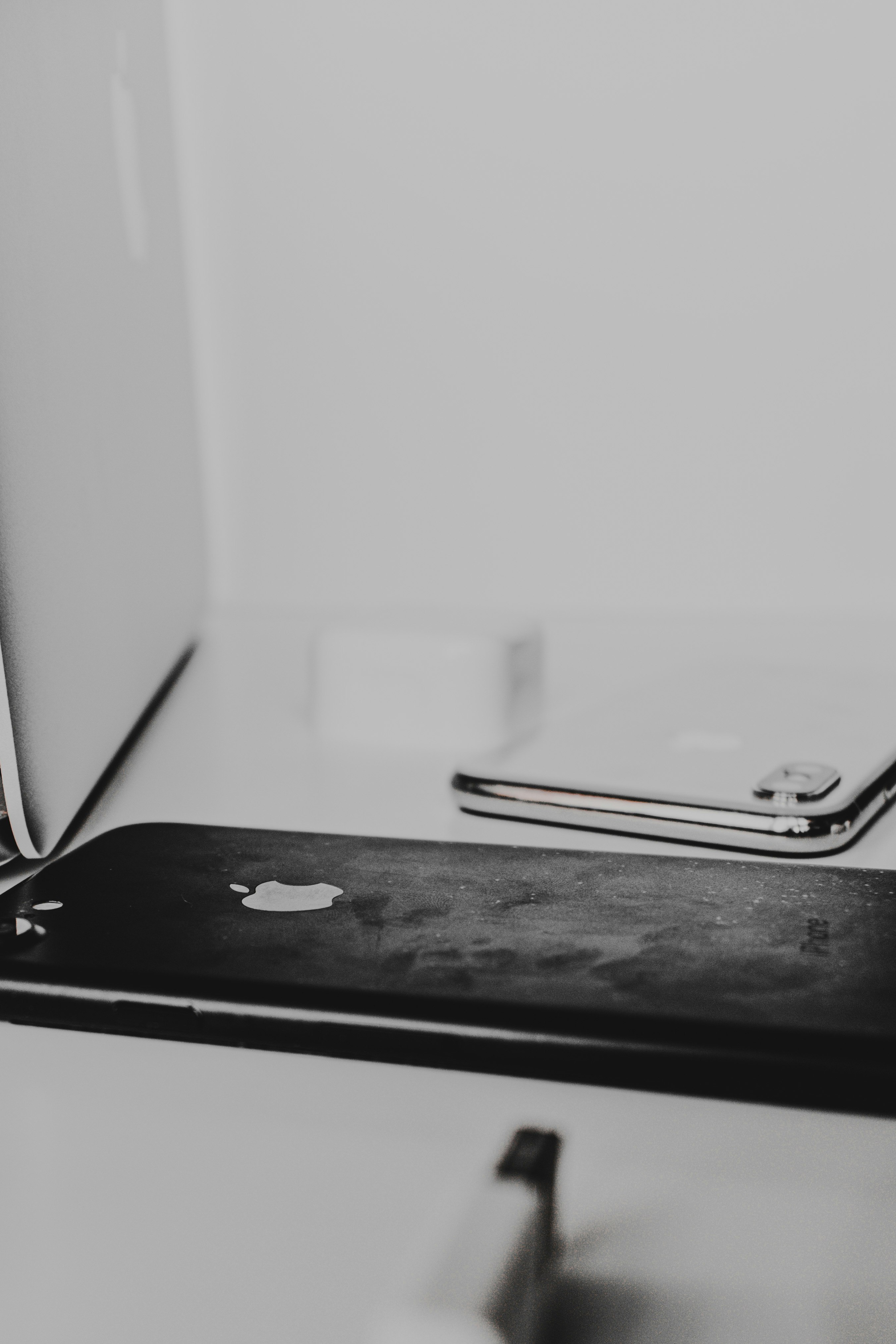 silver iphone 6 on black table